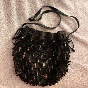 Black & gold leather bucket bag 80s vintage